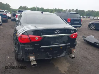 2014 Infiniti Q50 Premium z VIN JN1BV7AR4EM695232, wystawiony jako IAAI lot #42367581 z przebiegiem 138 063 mil mil oraz . Historia ofert i sprzedaży dostępna na DreamBid. Obrazek 16.