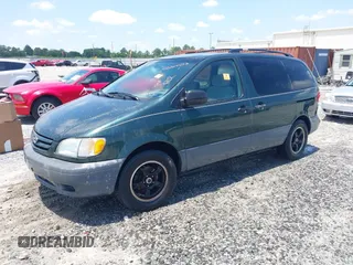 2002 Toyota Sienna LE with VIN 4T3ZF13C82U465948, listed as a IAAI auction lot 42264013 with 228,864 mi miles and . Bid and sale history available at DreamBid. Image 2.
