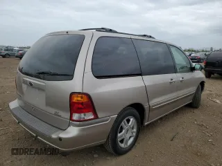 2003 Ford Windstar SE with VIN 2FMDA52413BB59104, listed as a Copart auction lot 55134805 with 132,918 mi miles and Salvage title. Bid and sale history available at DreamBid. Image 3.