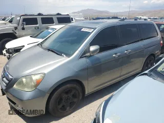 2005 Honda Odyssey Touring z VIN 5FNRL38805B131416, wystawiony jako Copart lot #59157395 z przebiegiem 263 087 mil mil oraz Szkoda całkowita • Salvage title. Historia ofert i sprzedaży dostępna na DreamBid. Obrazek 1.