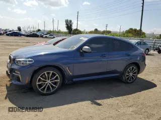 2019 BMW X4 M40i with VIN 5UXUJ5C57KLJ62744, listed as a Copart auction lot 43628303 with 31,448 mi miles. Bid and sale history available at carsss.com. Image 1.
