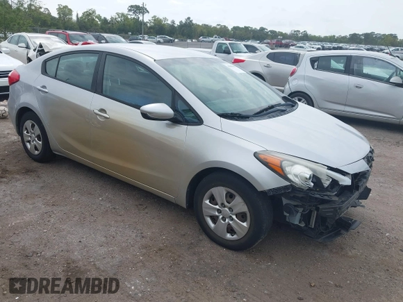 2015 Kia Forte LX with VIN KNAFK4A66F5407229, listed as a IAAI auction lot 41865696 with 124,232 mi miles. Bid and sale history available at carsss.com. Image 1.