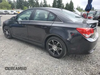 2014 Chevrolet Cruze 2LT with VIN 1G1PE5SB2E7364598, listed as a Copart auction lot 61970575 with 150,937 mi miles and Salvage title. Bid and sale history available at DreamBid. Image 2.