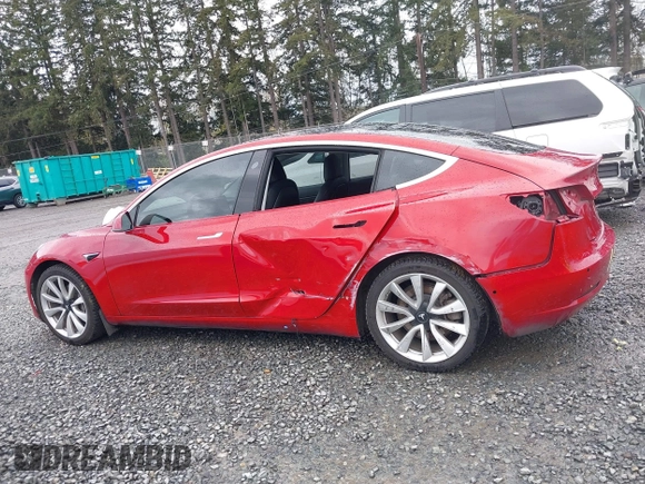2018 Tesla Model 3 Long Range Battery z VIN 5YJ3E1EB2JF087823, wystawiony jako IAAI lot #41903609 z przebiegiem 69 749 mil mil oraz . Historia ofert i sprzedaży dostępna na DreamBid. Obrazek 15.