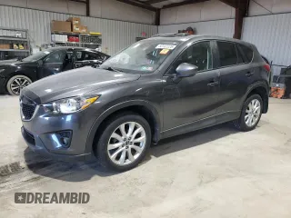 2014 Mazda CX-5 Grand Touring with VIN JM3KE4DY3E0337732, listed as a Copart auction lot 50102235 with 143,109 mi miles and Salvage Title. Bid and sale history available at carsss.com. Image 1.