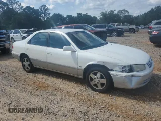 2001 Toyota Camry LE z VIN JT2BF22K310305858, wystawiony jako Copart lot #55231305 z przebiegiem 149 104 mil mil oraz Nie do naprawy • Non repairable. Historia ofert i sprzedaży dostępna na DreamBid. Obrazek 4.