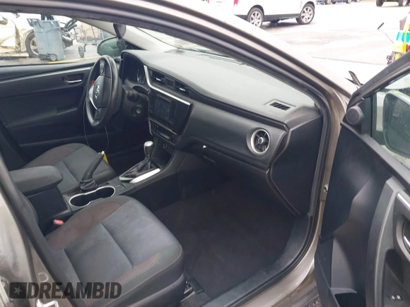 2018 Toyota Corolla L with VIN 2T1BURHE9JC092895, listed as a IAAI auction lot 42326623 with 135,046 mi miles and . Bid and sale history available at DreamBid. Image 5.