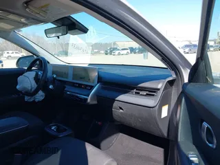 2023 Hyundai Ioniq 5 SE with VIN KM8KMDAF3PU215720, listed as a IAAI auction lot 41634633 with 12,007 mi miles and . Bid and sale history available at DreamBid. Image 5.