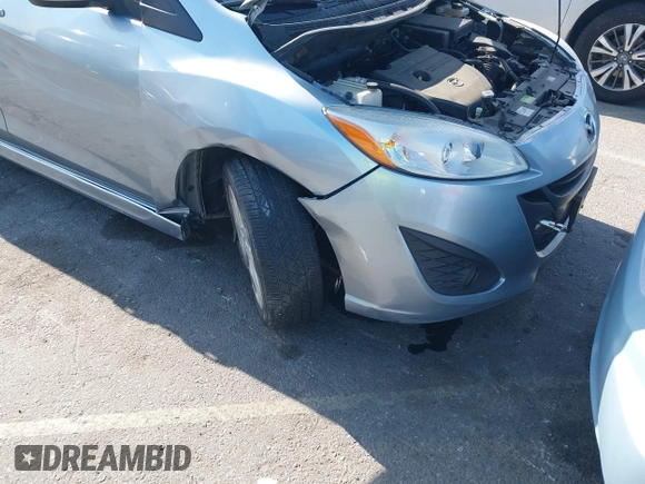 2012 Mazda 5 Grand Touring with VIN JM1CW2DL6C0126640, listed as a IAAI auction lot 42076722 with 124,412 mi miles and . Bid and sale history available at DreamBid. Image 6.