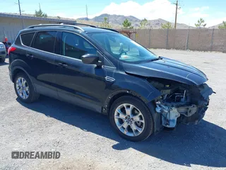 2014 Ford Escape SE z VIN 1FMCU9G97EUB64559, wystawiony jako IAAI lot #42238726 z przebiegiem 124 633 mil mil oraz . Historia ofert i sprzedaży dostępna na DreamBid. Obrazek 1.