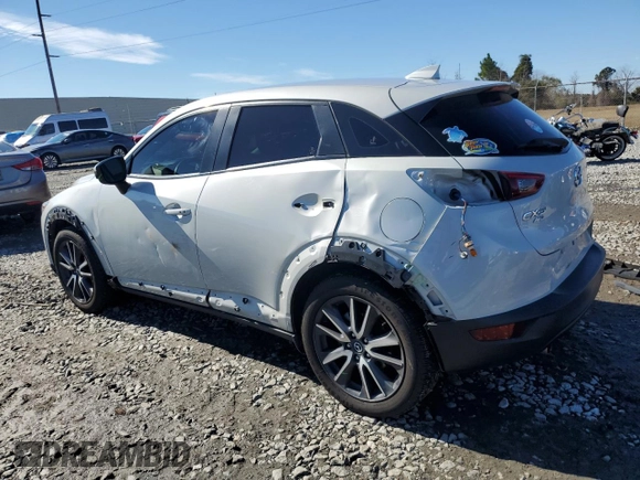2018 Mazda CX-3 Touring with VIN JM1DKFC71J1305316, listed as a Copart auction lot 88087095 with 68,279 mi miles and Salvage Title. Bid and sale history available at DreamBid. Image 2.