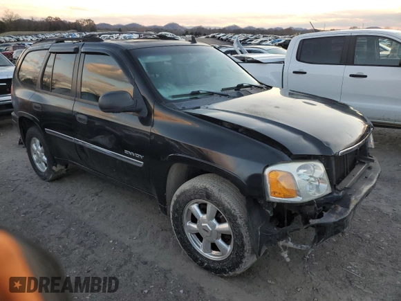 2006 GMC Envoy SLT with VIN 1GKDS13S662220064, listed as a Copart auction lot 84381274 with 237,220 mi miles and Salvage Title. Bid and sale history available at carsss.com. Image 4.