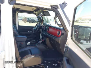 2022 Jeep Wrangler Unlimited Rubicon z VIN 1C4JJXFGXNW121489, wystawiony jako IAAI lot #41749550 z przebiegiem 56 601 mil mil oraz . Historia ofert i sprzedaży dostępna na DreamBid. Obrazek 5.