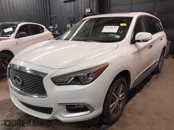 2016 Infiniti QX60 with VIN 5N1AL0MM0GC511950, listed as a IAAI auction lot 41690626 with 102,198 mi miles and . Bid and sale history available at DreamBid. Image 21.