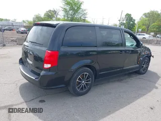 2019 Dodge Grand Caravan GT with VIN 2C4RDGEG5KR614223, listed as a IAAI auction lot 42172107 with 130,897 mi miles and . Bid and sale history available at DreamBid. Image 4.