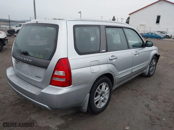 2004 Subaru Forester (Natl) XT with VIN JF1SG69694H733997, listed as a IAAI auction lot 41459463 with 219,973 mi miles. Bid and sale history available at carsss.com. Image 4.