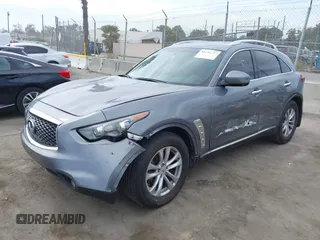 2014 Infiniti QX70 with VIN JN8CS1MU8EM450428, listed as a IAAI auction lot 42233727 with 88,342 mi miles and . Bid and sale history available at DreamBid. Image 22.