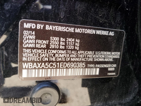 2014 BMW 5 Series 535d with VIN WBAXA5C51ED690385, listed as a Copart auction lot 57290645 with 161,694 mi miles and Salvage title. Bid and sale history available at DreamBid. Image 12.
