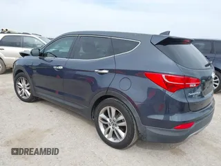 2013 Hyundai Santa Fe Sport z VIN 5XYZW3LAXDG066096, wystawiony jako IAAI lot #41717516 z przebiegiem 135 922 mil mil oraz . Historia ofert i sprzedaży dostępna na DreamBid. Obrazek 3.