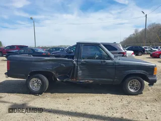 1992 Ford Ranger XLT z VIN 1FTCR10X3NUA73868, wystawiony jako IAAI lot #41836220 z przebiegiem 97 165 mil mil oraz . Historia ofert i sprzedaży dostępna na DreamBid. Obrazek 13.