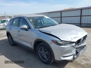 2019 Mazda CX-5 Sport with VIN JM3KFBBM6K1582760, listed as a IAAI auction lot 41822152 with 60,620 mi miles and . Bid and sale history available at carsss.com. Image 1.