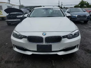 2014 BMW 3 Series 328i xDrive с VIN WBA3B5G55ENS11000, выставлен на аукционе Copart как лот 60716015 с пробегом 123 609 миль миль и Списание • Salvage title. История ставок и продаж доступна на DreamBid. Изображение 5.