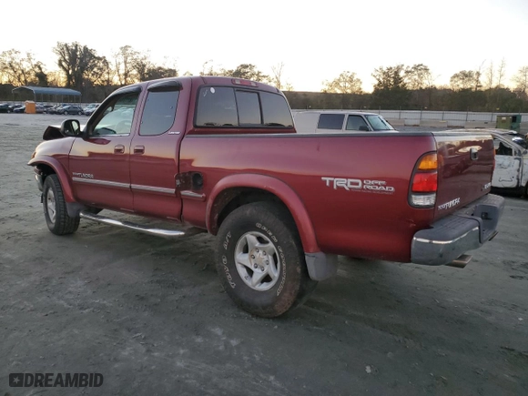 2001 Toyota Tundra Ltd with VIN 5TBBT48151S214199, listed as a Copart auction lot 81174404 with 165,256 mi miles and Salvage Title. Bid and sale history available at carsss.com. Image 2.