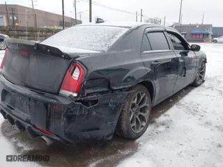 2015 Chrysler 300 with VIN 2C3CCABT1FH853985, listed as a IAAI auction lot 41165363 with 97,411 mi miles. Bid and sale history available at carsss.com. Image 4.