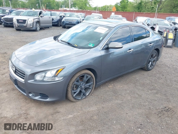 2014 Nissan Maxima S with VIN 1N4AA5AP9EC432415, listed as a IAAI auction lot 42230164 with 149,080 mi miles and . Bid and sale history available at DreamBid. Image 2.