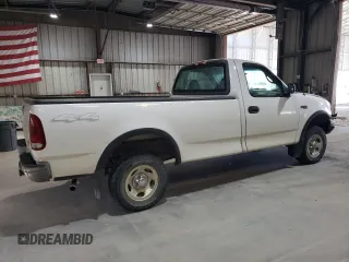 2000 Ford F-150 XL with VIN 1FTZF182XYNC09505, listed as a Copart auction lot 73420184 with 296,202 mi miles and Salvage title. Bid and sale history available at DreamBid. Image 3.