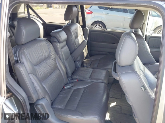 2007 Honda Odyssey EX-L with VIN 5FNRL38677B021464, listed as a IAAI auction lot 41568582 with 131,359 mi miles and . Bid and sale history available at DreamBid. Image 8.