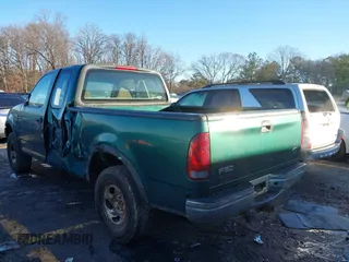 1999 Ford F-150 z VIN 1FTRX18W7XNA40655, wystawiony jako IAAI lot #41445754 z przebiegiem 362 296 mil mil oraz . Historia ofert i sprzedaży dostępna na DreamBid. Obrazek 3.