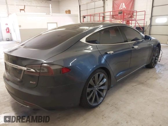 2014 Tesla Model S 60 with VIN 5YJSA1H13EFP49912, listed as a IAAI auction lot 41716661 with 129,776 mi miles and . Bid and sale history available at DreamBid. Image 4.
