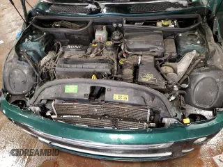 2006 MINI Convertible z VIN WMWRF33596TF64235, wystawiony jako Copart lot #43614735 z przebiegiem 138 541 mil mil oraz Czysty tytuł • Clean title. Historia ofert i sprzedaży dostępna na DreamBid. Obrazek 13.