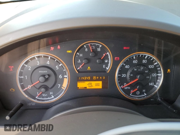 2013 Nissan Titan SV with VIN 1N6AA0EC1DN310572, listed as a Copart auction lot 50017235 with 114,349 mi miles and Salvage title. Bid and sale history available at DreamBid. Image 9.