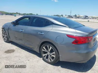 2016 Nissan Maxima SL with VIN 1N4AA6AP9GC901494, listed as a IAAI auction lot 42023106 with 160,581 mi miles and . Bid and sale history available at DreamBid. Image 3.