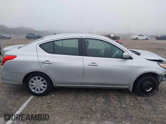 2015 Nissan Versa S Plus with VIN 3N1CN7AP0FL810844, listed as a IAAI auction lot 41386594 with 118,606 mi miles. Bid and sale history available at carsss.com. Image 14.