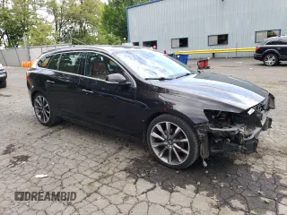 2015 Volvo V60 T5 Drive-E Platinum with VIN YV140MEM7F1218731, listed as a Copart auction lot 58333695 with 103,717 mi miles and Salvage title. Bid and sale history available at DreamBid. Image 4.