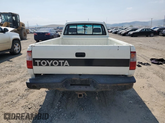 1993 Toyota T100 DX z VIN JT4VD10A5P0010588, wystawiony jako Copart lot #63862014 z przebiegiem 295 012 mil mil oraz Czysty tytuł • Clean title. Historia ofert i sprzedaży dostępna na DreamBid. Obrazek 6.
