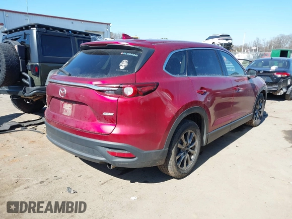 2018 Mazda CX-9 Touring with VIN JM3TCBCY9J0215077, listed as a IAAI auction lot 41639459 with 137,564 mi miles. Bid and sale history available at carsss.com. Image 4.
