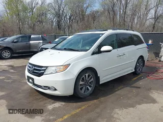 2014 Honda Odyssey Touring с VIN 5FNRL5H94EB057681, выставлен на аукционе IAAI как лот 41828000 с пробегом 249 350 миль миль и . История ставок и продаж доступна на DreamBid. Изображение 2.