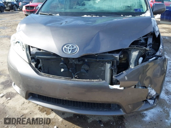 2013 Toyota Sienna LE with VIN 5TDJK3DC8DS056730, listed as a IAAI auction lot 41141247 with 166,579 mi miles and . Bid and sale history available at DreamBid. Image 6.