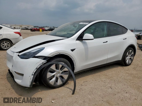 2024 Tesla Model Y Long Range with VIN 7SAYGDEE6RA290124, listed as a Copart auction lot 57662385 with 14,751 mi miles and Salvage title. Bid and sale history available at DreamBid. Image 1.