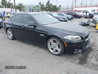 2015 BMW 5 Series 535i with VIN WBA5B1C55FG128387, listed as a IAAI auction lot 41885806 with 94,734 mi miles and . Bid and sale history available at carsss.com. Image 1.