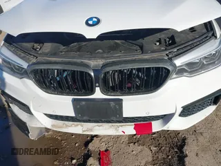 2018 BMW 5 Series M550i xDrive with VIN WBAJB9C54JB050218, listed as a IAAI auction lot 41132695 with 69,659 mi miles. Bid and sale history available at carsss.com. Image 6.