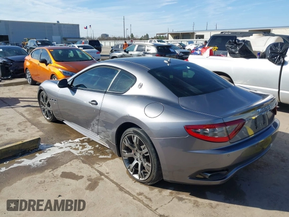 2013 Maserati GranTurismo Sport with VIN ZAM45VLA7D0074506, listed as a IAAI auction lot 41455462 with 34,292 mi miles and . Bid and sale history available at DreamBid. Image 3.