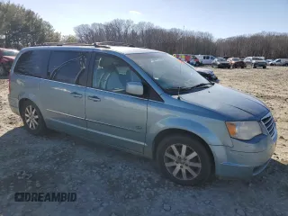 2009 Chrysler Town & Country Touring with VIN 2A8HR54X99R640099, listed as a Copart auction lot 46584725 with 216,881 mi miles and Salvage Title. Bid and sale history available at DreamBid. Image 4.