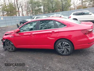 2021 Volkswagen Jetta SEL with VIN 3VWE57BU2MM041875, listed as a IAAI auction lot 41534030 with 20,282 mi miles and . Bid and sale history available at DreamBid. Image 14.