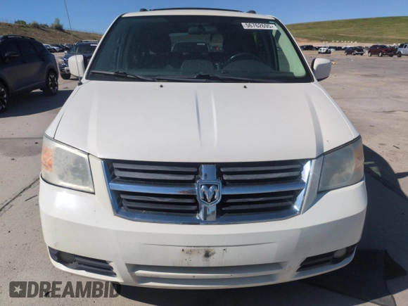 2010 Dodge Grand Caravan SXT with VIN 2D4RN5D16AR444938, listed as a Copart auction lot 56762695 with 251,437 mi miles and Clean Title. Bid and sale history available at DreamBid. Image 5.