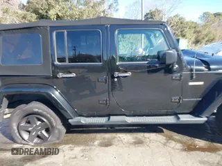 2016 Jeep Wrangler Unlimited Sport with VIN 1C4BJWDG1GL226069, listed as a IAAI auction lot 41003276 with 88,015 mi miles and . Bid and sale history available at DreamBid. Image 13.